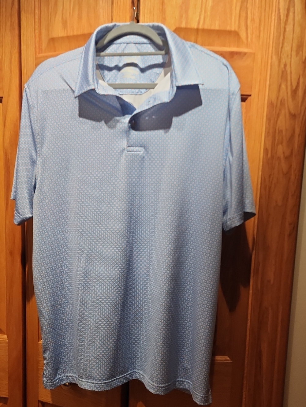 Men's Light Blue Polo Shirt with Subtle Micro-Pattern